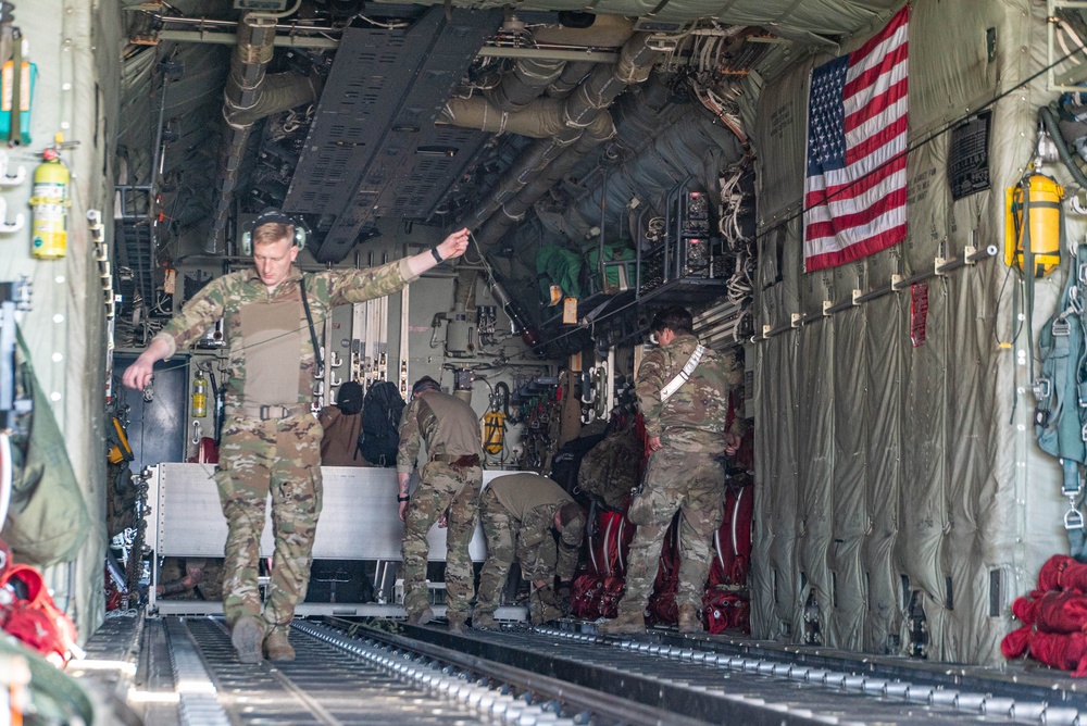 Airmen load AFCENT C-130s with humanitarian aid bound for Gaza