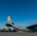 Airmen load AFCENT C-130s with humanitarian aid bound for Gaza