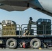 Airmen load AFCENT C-130s with humanitarian aid bound for Gaza