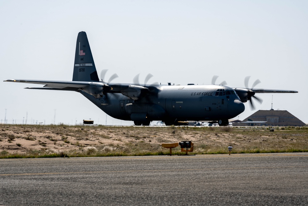 Airmen load AFCENT C-130s with humanitarian aid bound for Gaza