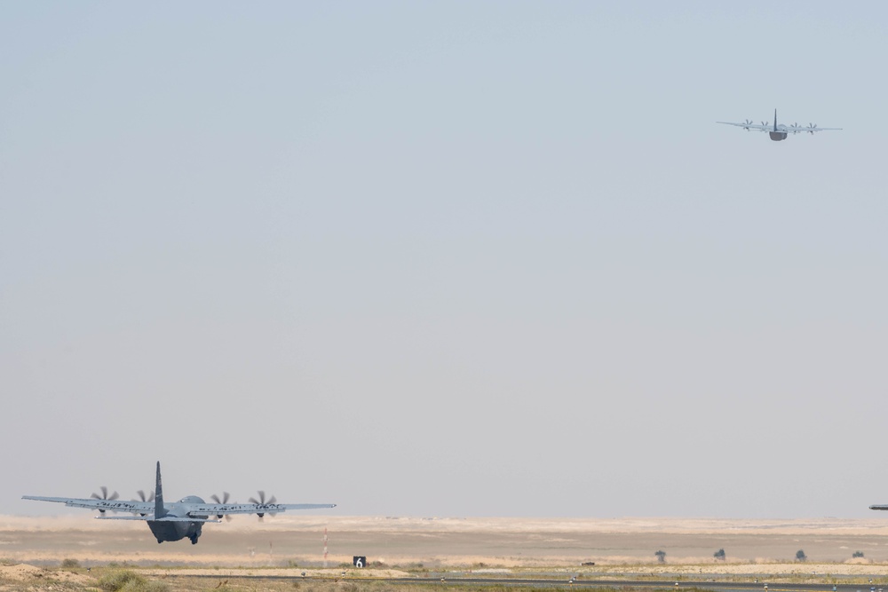 Airmen load AFCENT C-130s with humanitarian aid bound for Gaza