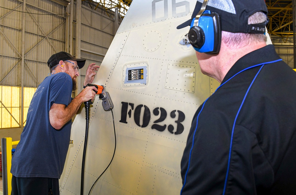 FRCSE debuts electrical discharge machining device on its F-5 Aircraft Production Line