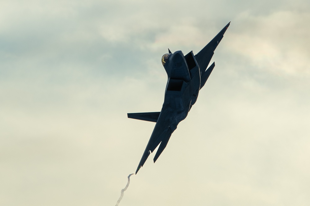 F-22 Raptors fly over JBER