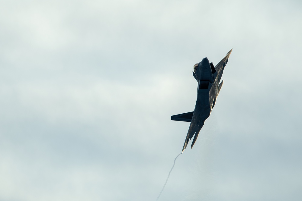 F-22 Raptors fly over JBER