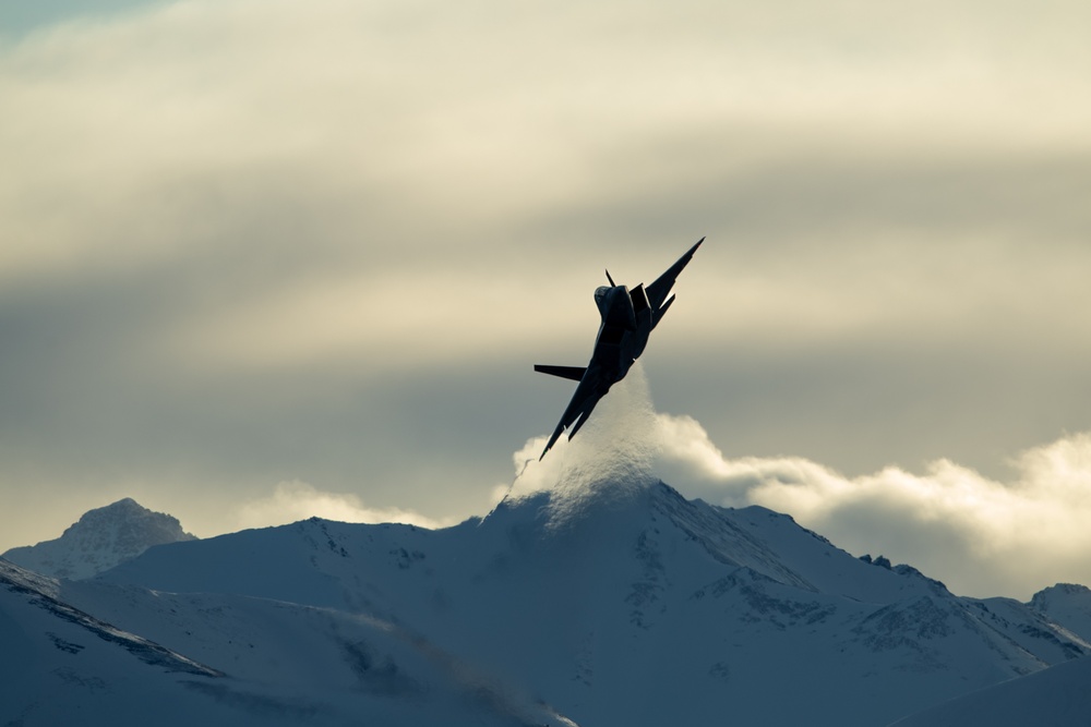 F-22 Raptors fly over JBER