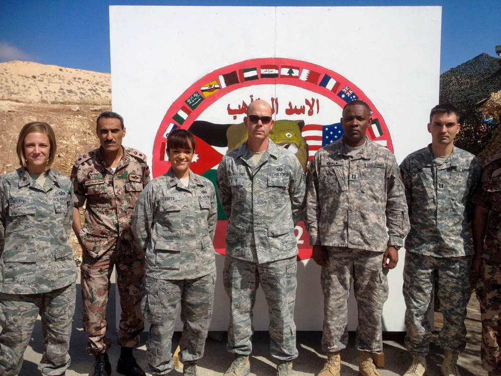 Col. Lopez poses with members of the J-8 team while deployed to Jordan