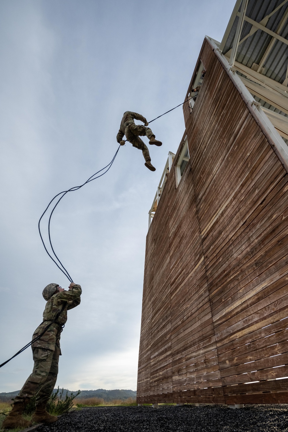 U.S. Army Reserve Soldiers complete repel tower during the Division Best Squad Competition