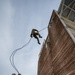 U.S. Army Reserve Soldiers complete repel tower during the Division Best Squad Competition