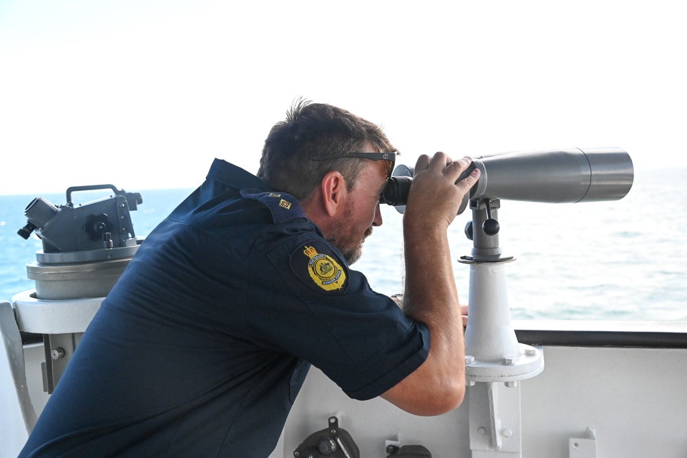 U.S. Coast Guard Cutter Harriet Lane moors in Cairns, Australia