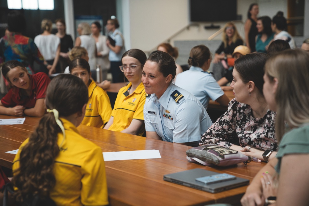 U.S. Coast Guard Cutter Harriet Lane crew attends International Women's Day confrence in Cairns, Australia.