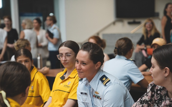 U.S. Coast Guard Cutter Harriet Lane crew attends International Women's Day confrence in Cairns, Australia.