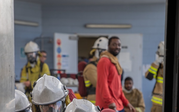 U.S. Coast Guard Cutter Harriet Lane attend damage control school in Cairns, Australia