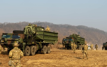 U.S., ROK Soldiers prepare bridging system to cross river