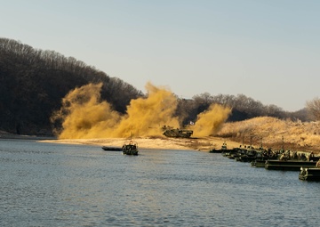ROK tank simulates fire after crossing Improved Ribbon Bridge