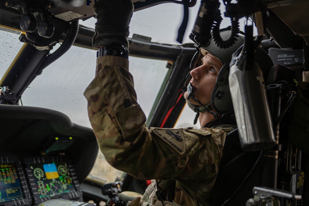 U.S. Army Pilot conducts pre-flight checks