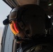 U.S. Army Door Gunner scans the desert