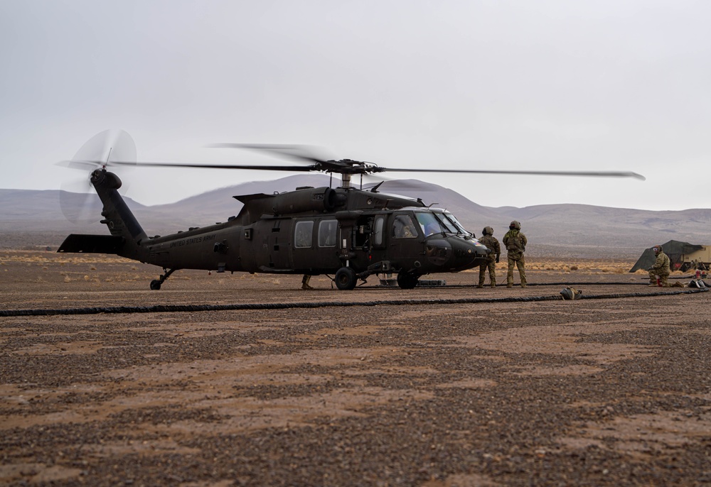 UH-60M Black Hawk refuels at FARP