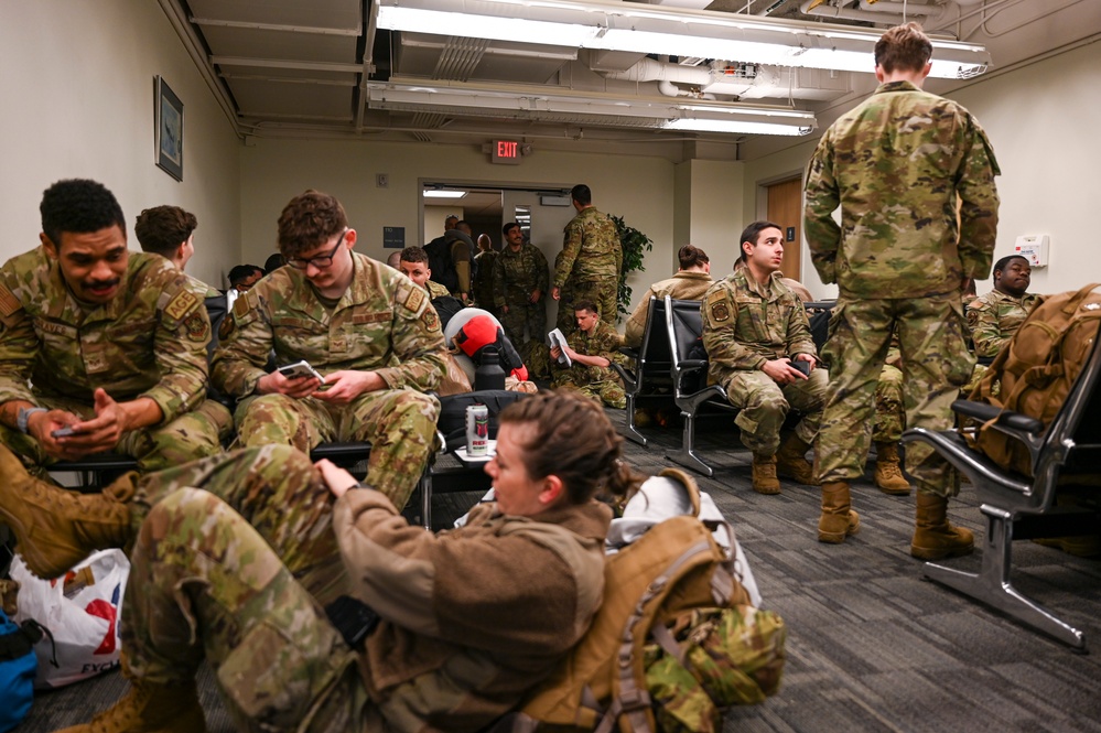 Airmen assigned to the 92nd Maintenance Group depart for deployment