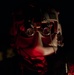 U.S. Army Flight Medics checks his night vision goggles