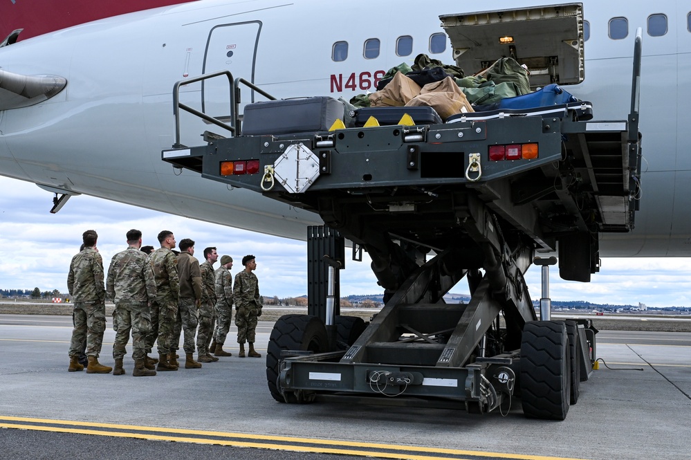 Airmen assigned to the 92nd Maintenance Group depart for deployment