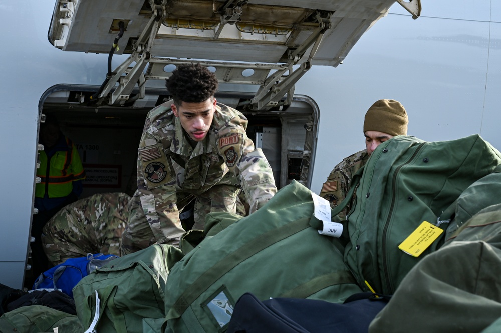 Airmen assigned to the 92nd Maintenance Group depart for deployment