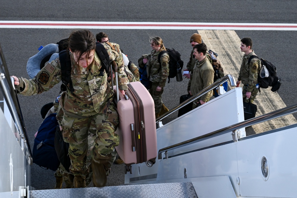 Airmen assigned to the 92nd Maintenance Group depart for deployment