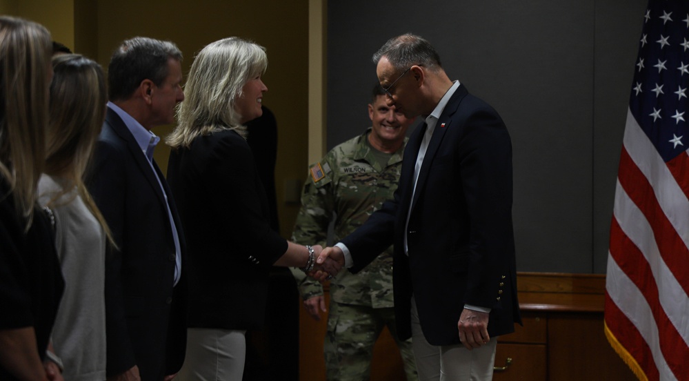 3rd Infantry Division leadership and spouses await Polish President Andrzej Duda