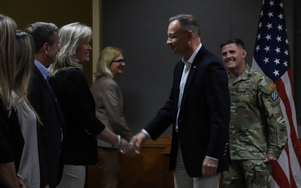 3rd Infantry Division leadership and spouses await Polish President Andrzej Duda