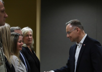 3rd Infantry Division leadership and spouses await Polish President Andrzej Duda