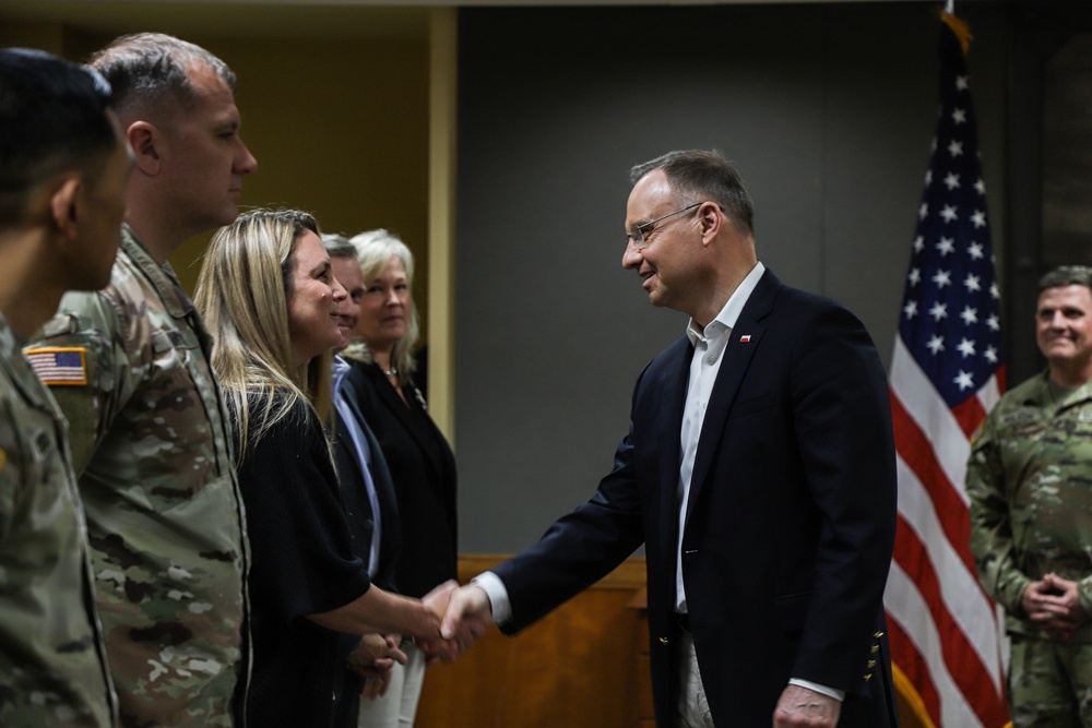3rd Infantry Division leadership and spouses await Polish President Andrzej Duda