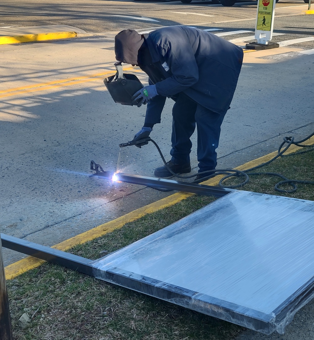 Garrison updates sign for Installation Support Office