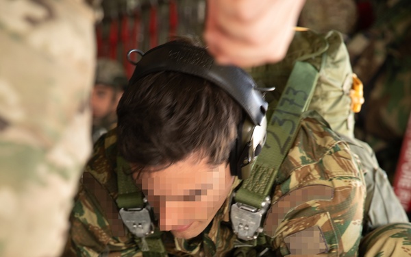 Greek special operations forces soldiers jump during Trojan Footprint 2024