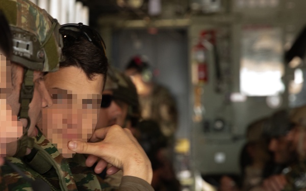 Greek special operations forces soldiers jump during Trojan Footprint 2024