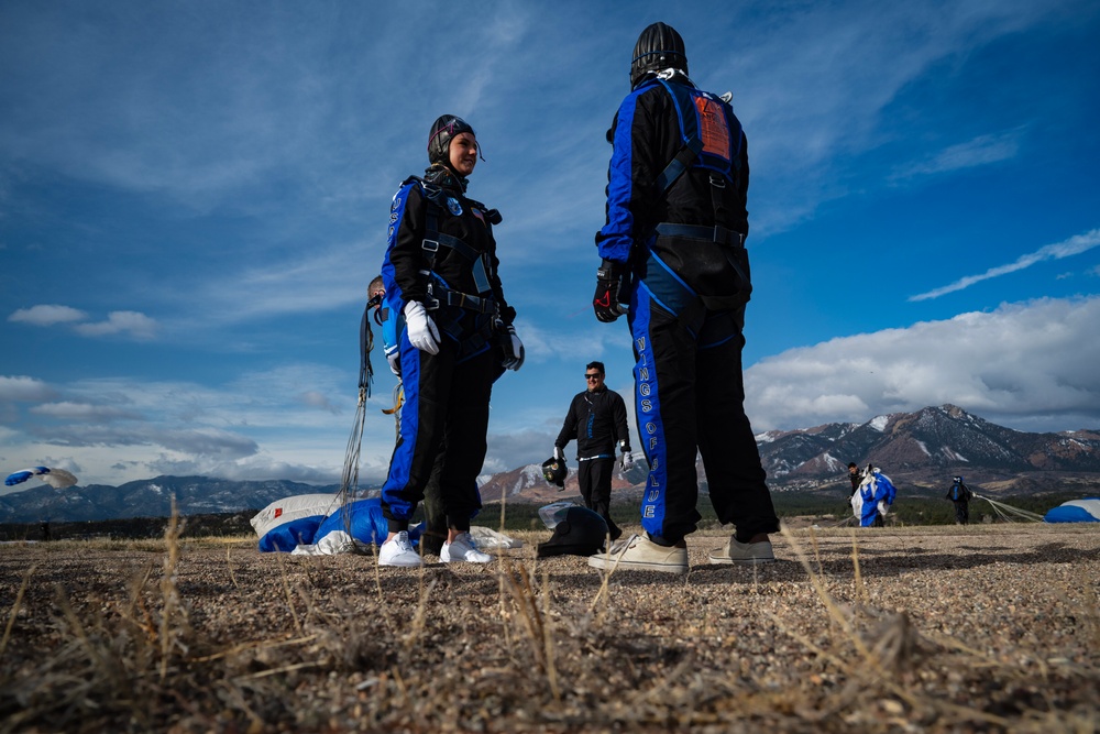 Free fallin’: Team Sorensen lets Wings of Blue take the wheel during tandem jump