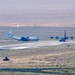 Airmen load AFCENT C-130s with humanitarian aid bound for Gaza