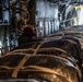 Airmen load AFCENT C-130s with humanitarian aid bound for Gaza