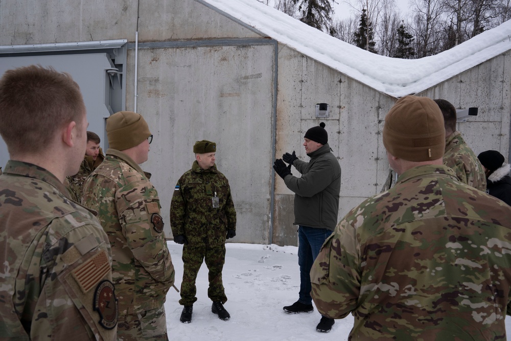 Estonian and U.S. Air Force personnel collaborate on munitions storage and infrastructure practices in Alaska