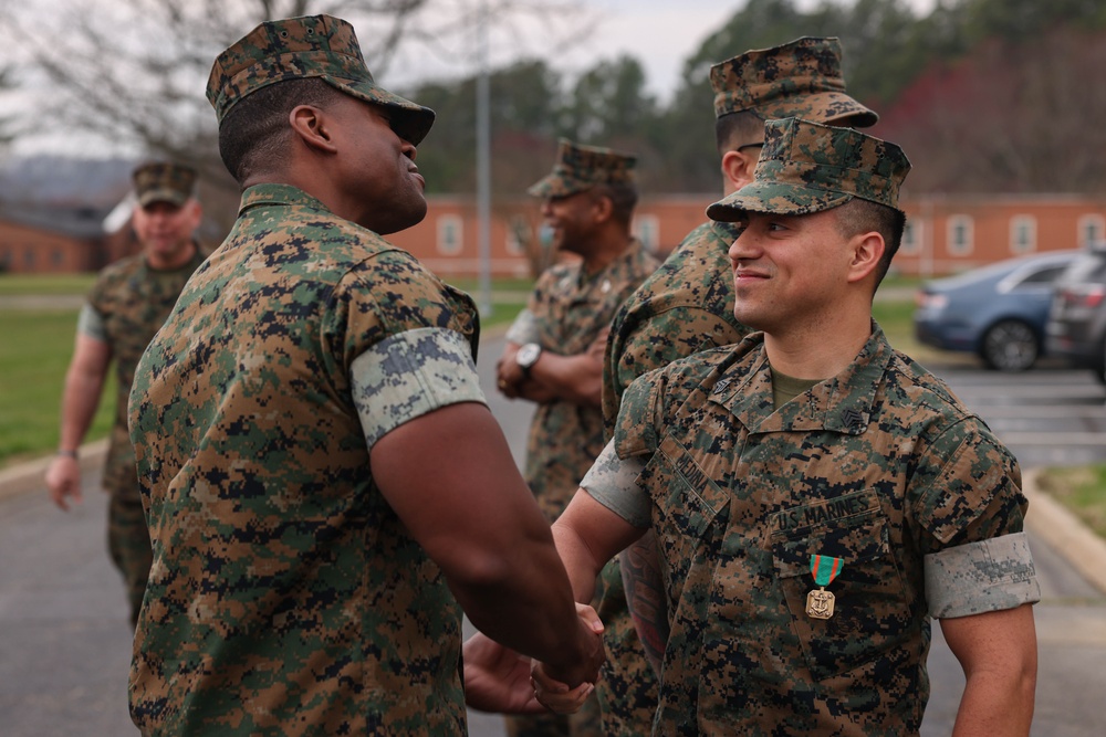 Sgt. Medina receives award from Col. Brooks