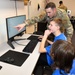 Hill AFB Airmen mentor future cyber defenders at local school