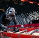 Sailor performs maintenance on USS John S. McCain