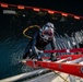 Sailor performs maintenance on USS John S. McCain