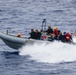 USS John S. McCain conduct small boat operations