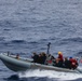 USS John S. McCain conduct small boat operations