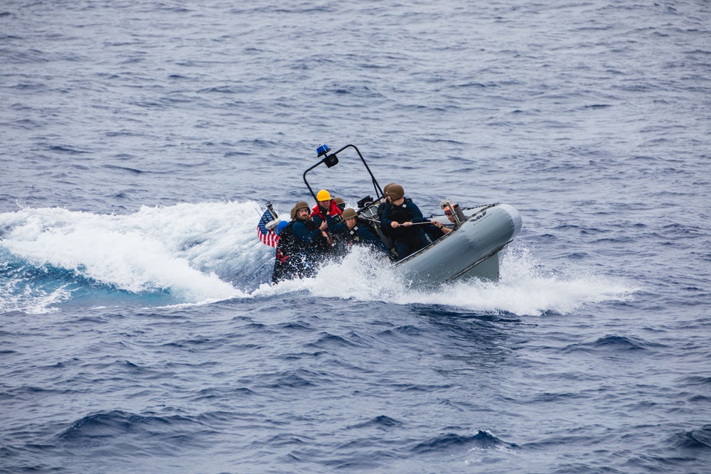 USS John S. McCain conduct small boat operations