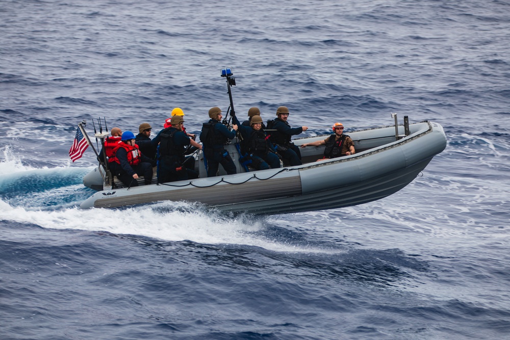 USS John S. McCain conduct small boat operations