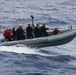 USS John S. McCain conduct small boat operations