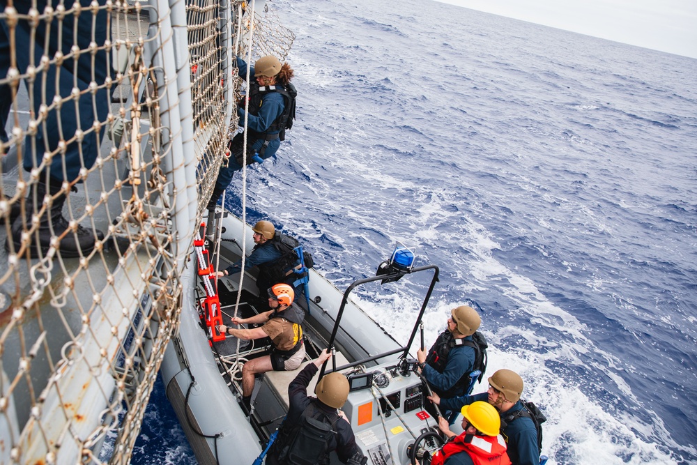 USS John S. McCain conduct small boat operations