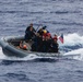 USS John S. McCain conduct small boat operations