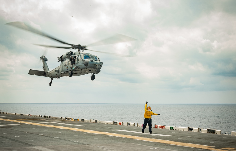 USS America (LHA 6) Sailors conduct flight operations