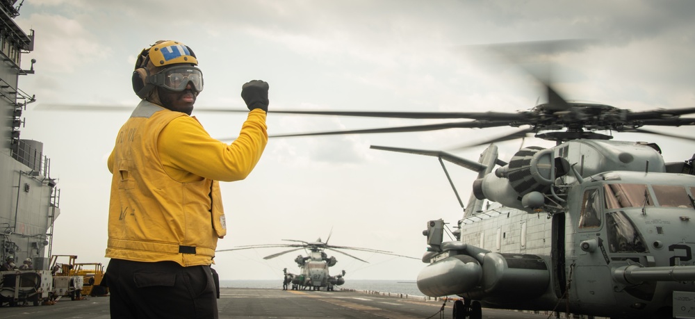 USS America (LHA 6) Sailors conduct flight operations